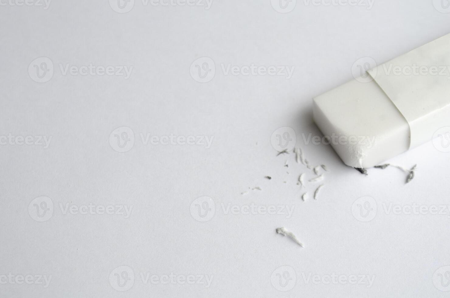 Top view of eraser on white cover background with customizable space for text. photo
