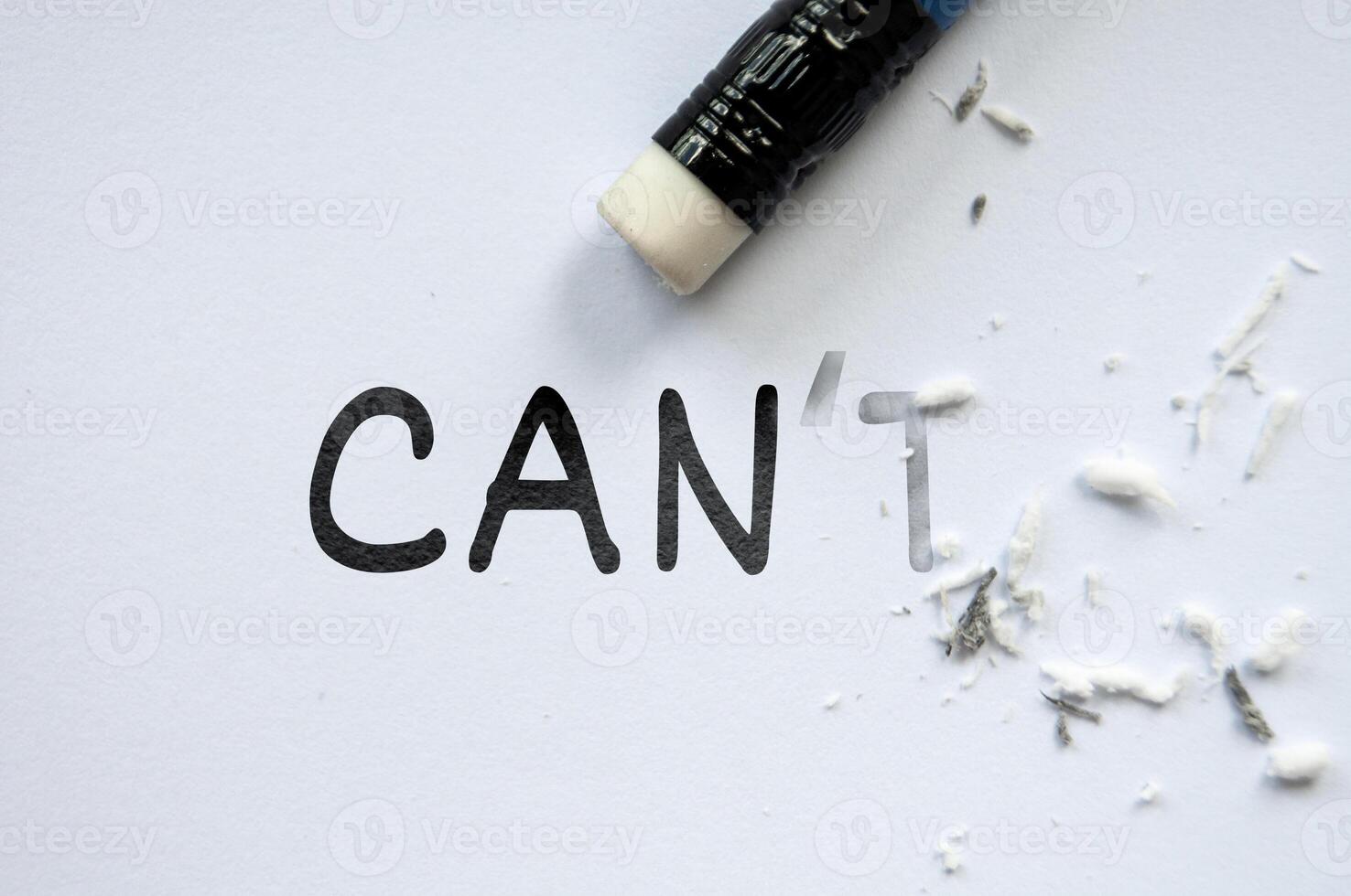 Pencil eraser erasing cannot into can. Motivational and inspirational concept photo