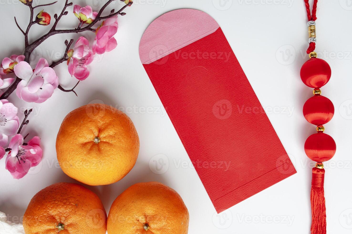 Top view of red envelope with customizable space for text or greetings. Copy space photo