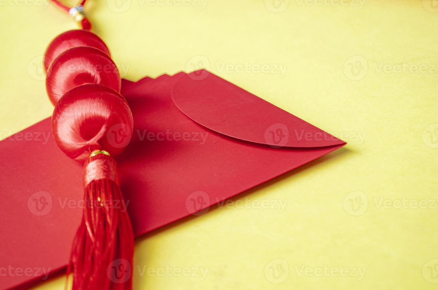Side view of Chinese New Year red packet with customizable space for text or wishes. Chinese New Year celebration concept. photo