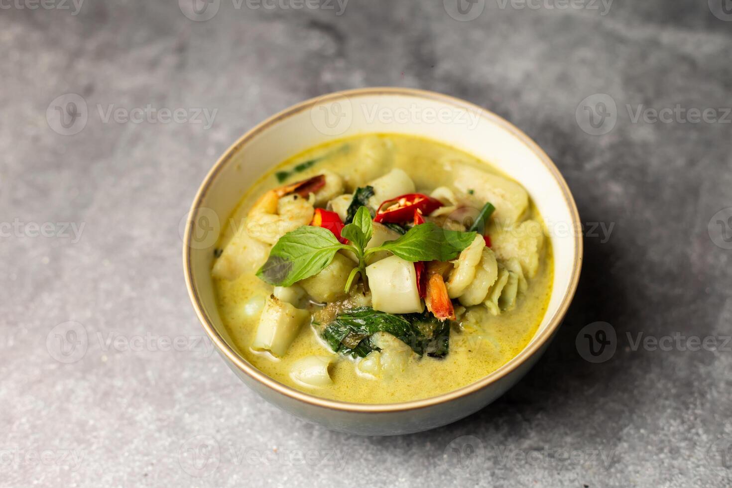 Green Curry Sea Food served in dish isolated isolated on background top view of bangladesh food photo