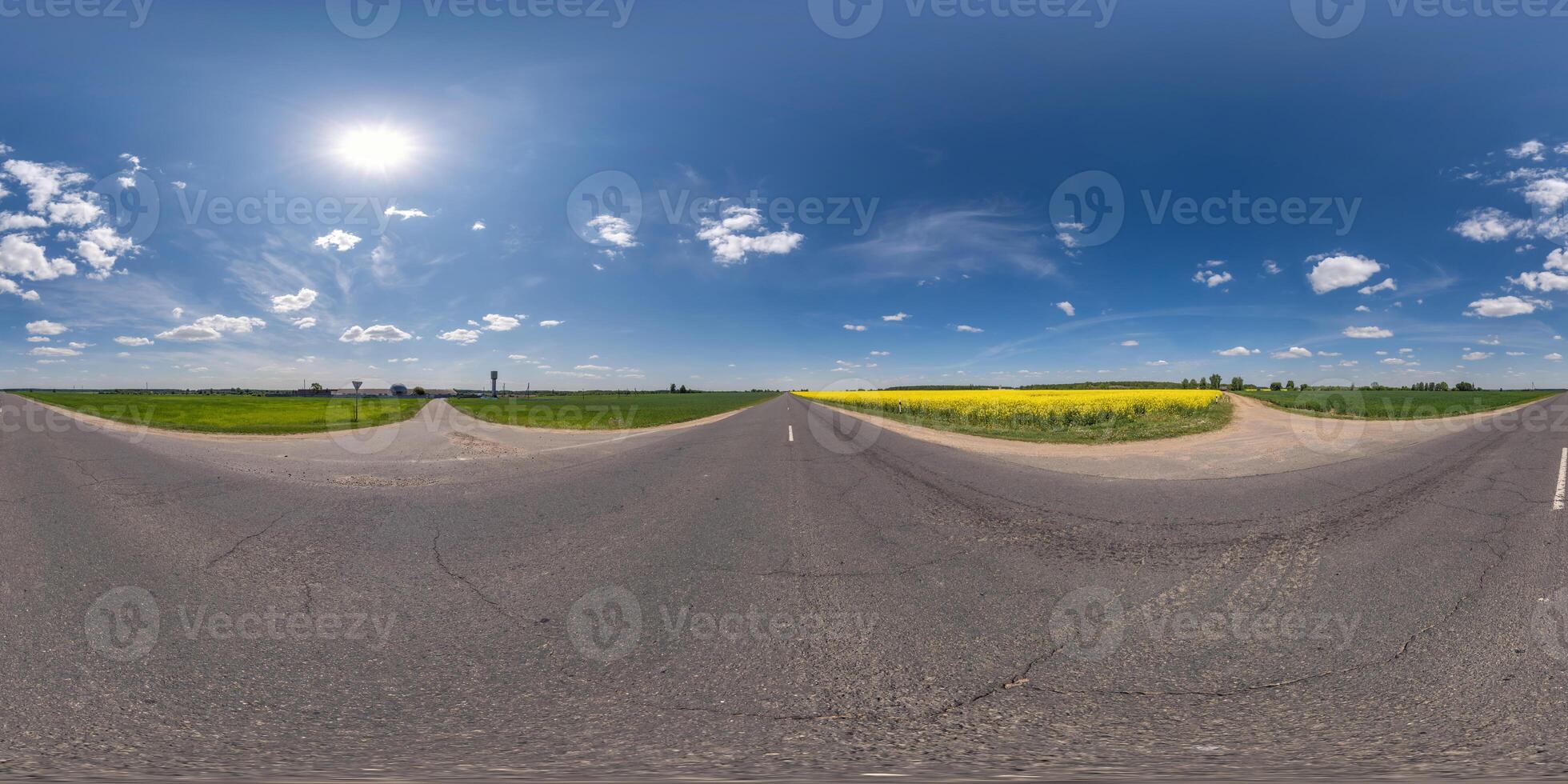 spherical 360 hdri panorama on old asphalt road among corn fields with clear blue sky and sun in equirectangular seamless projection, as skydome replacement in drone panoramas, game development photo
