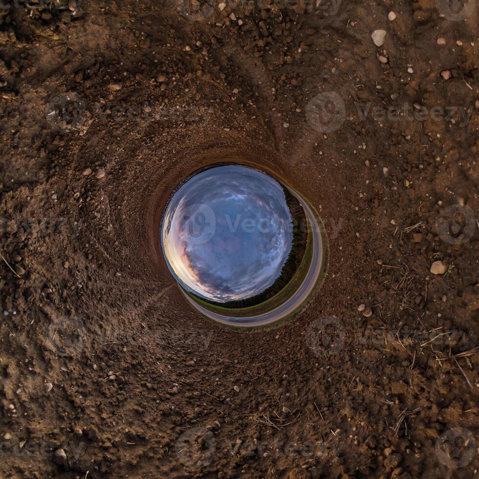 blue hole sphere little planet inside green grass round frame background photo