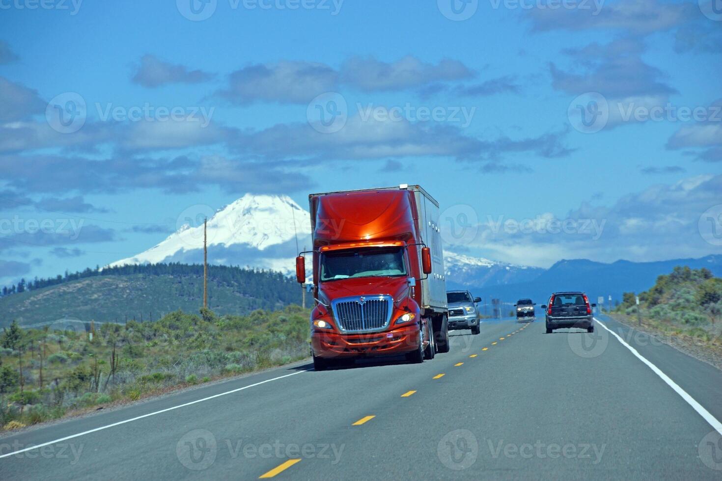 A mirage distorts traffic images  on highway photo