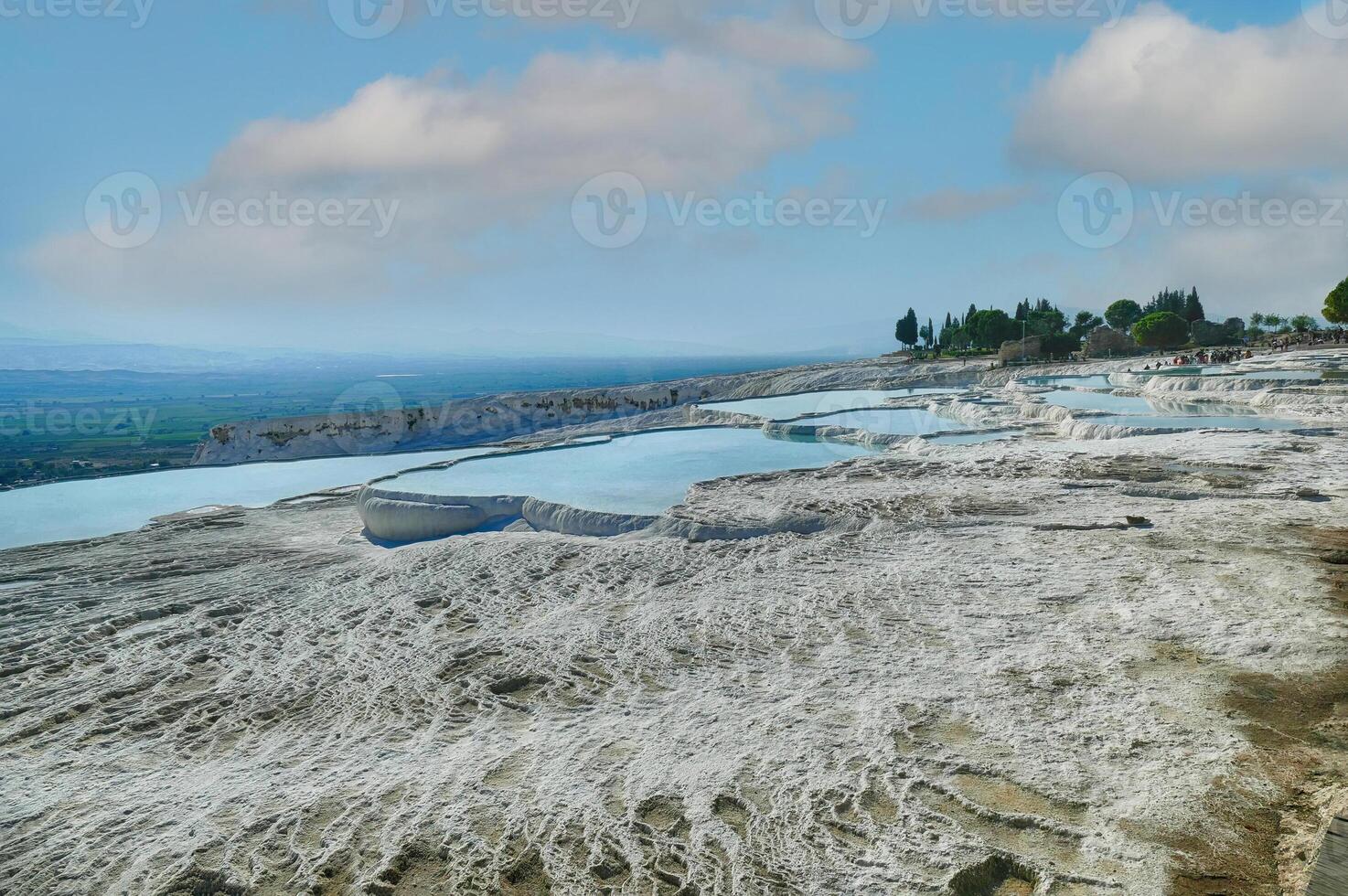 Calcium deposits  on travertine turquoise  terraced pools at  Pamukkale photo