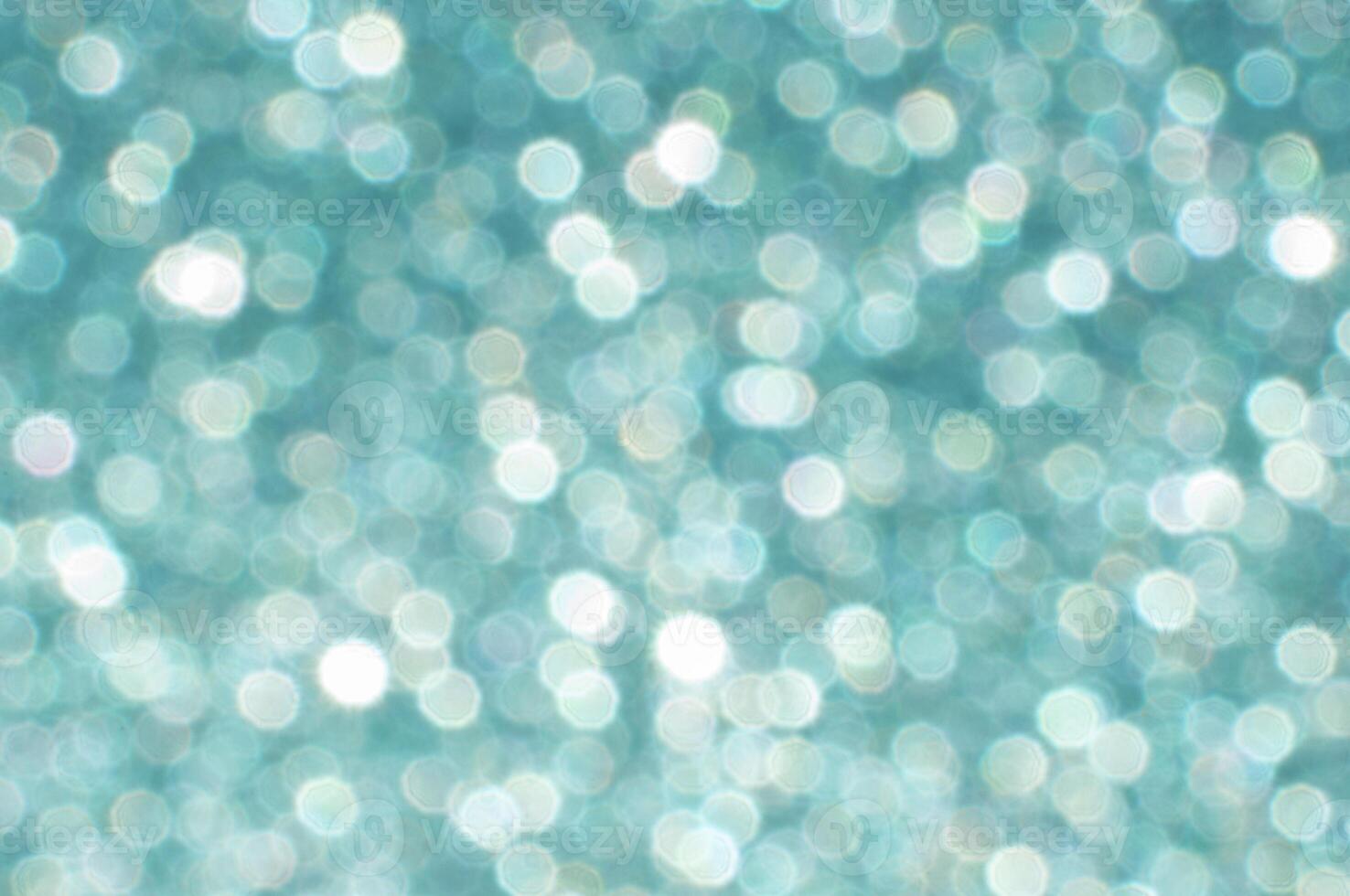 sparkling blue bokeh from drops, abstraction, festive background photo