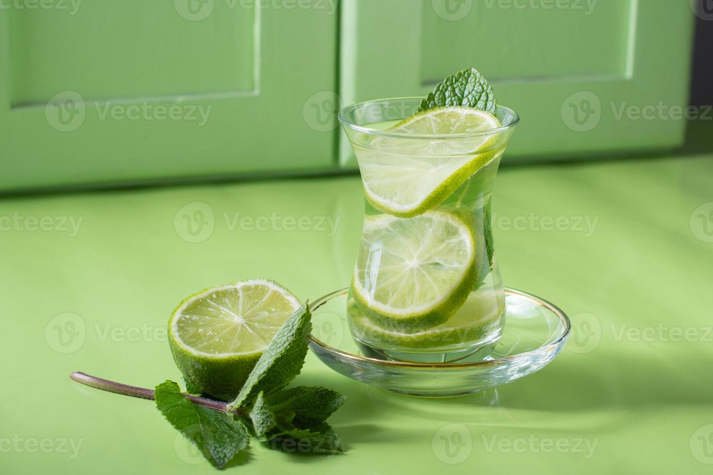 tea with mint and lime, with a calming effect, green still life close-up photo