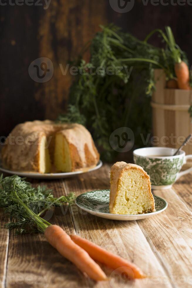 Sugar glazed carrot cake, homemade baked goods, rustic, national carrot cake day photo