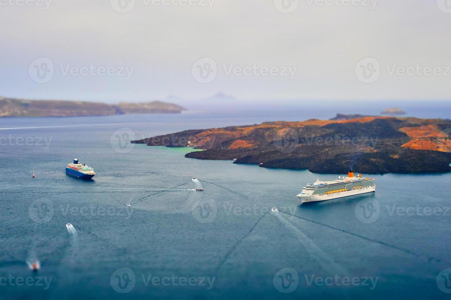 Cruise ships and tourist boats in sea photo