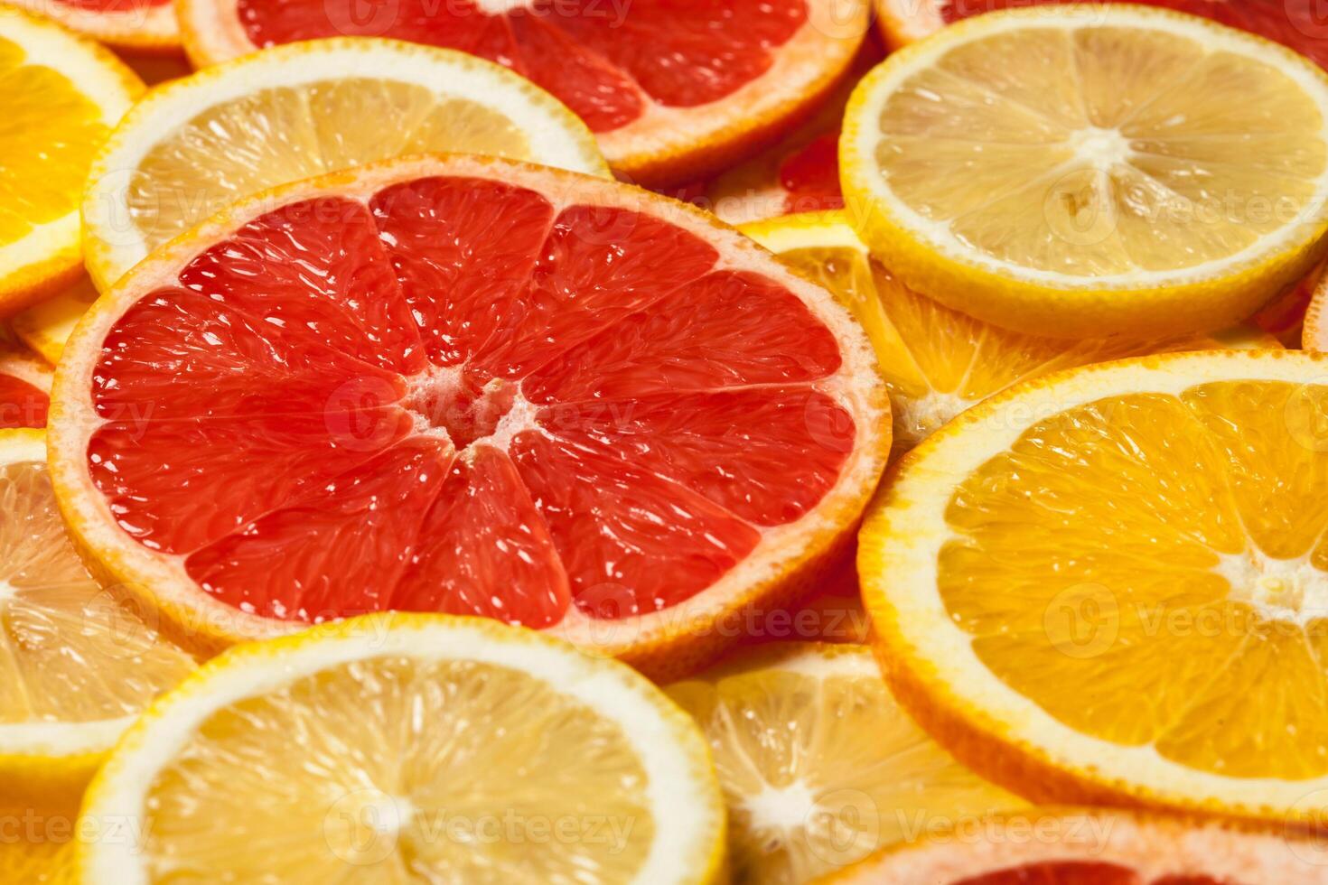 Colorful citrus fruit slices photo