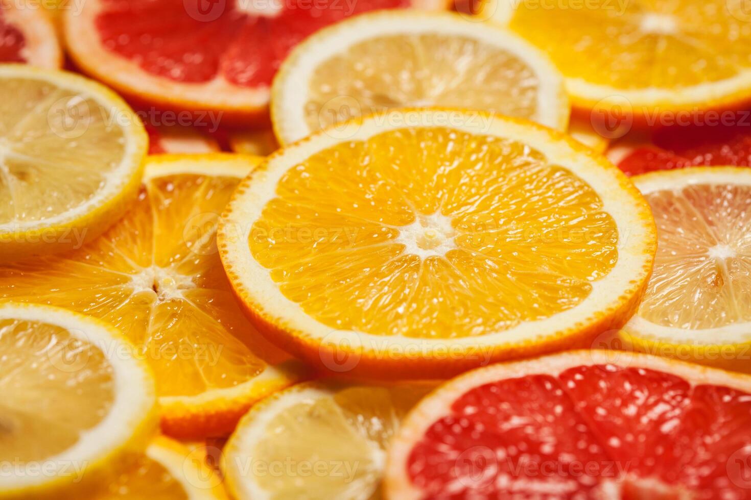 Colorful citrus fruit slices photo