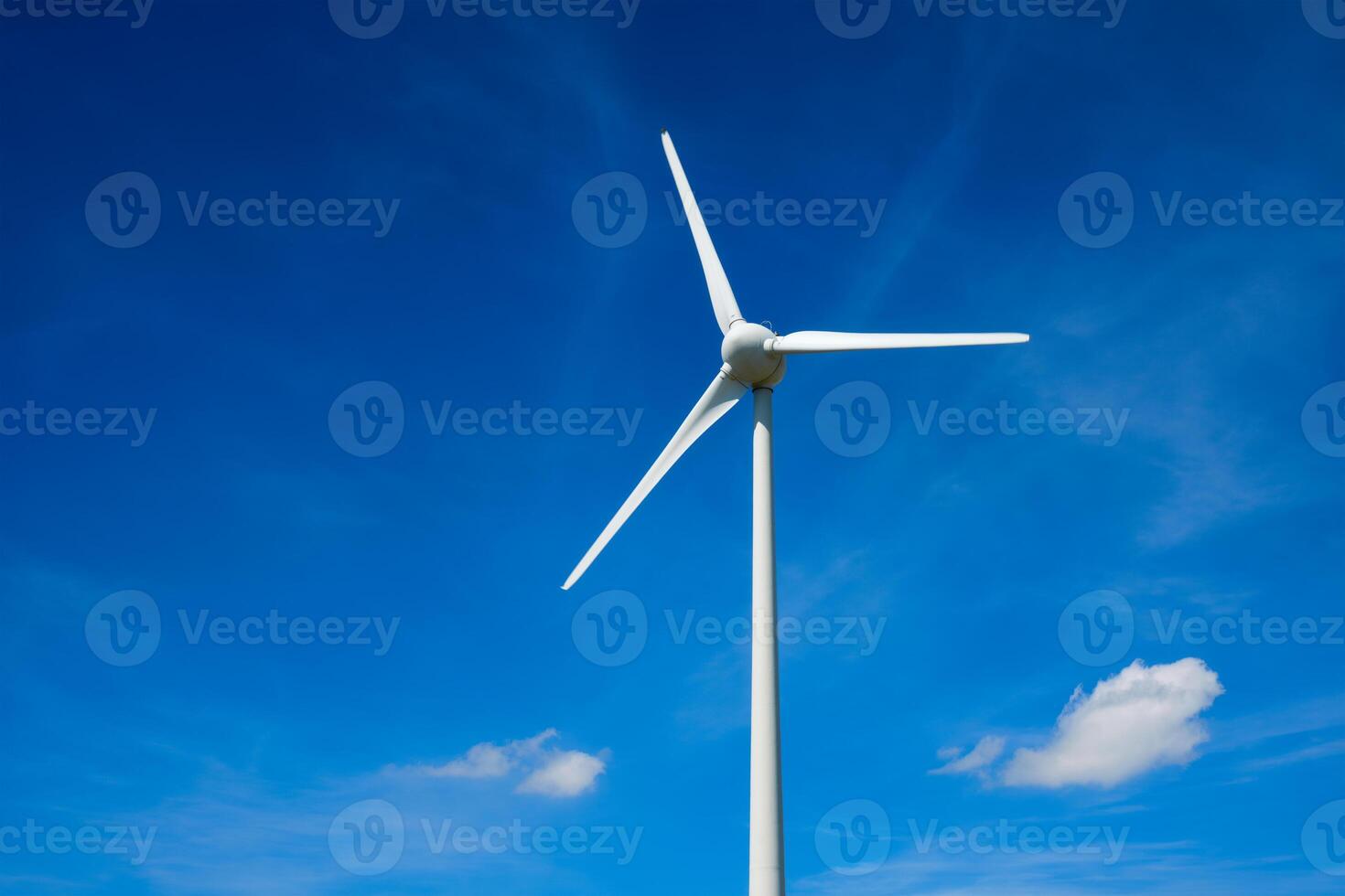 Wind generator turbines in sky photo