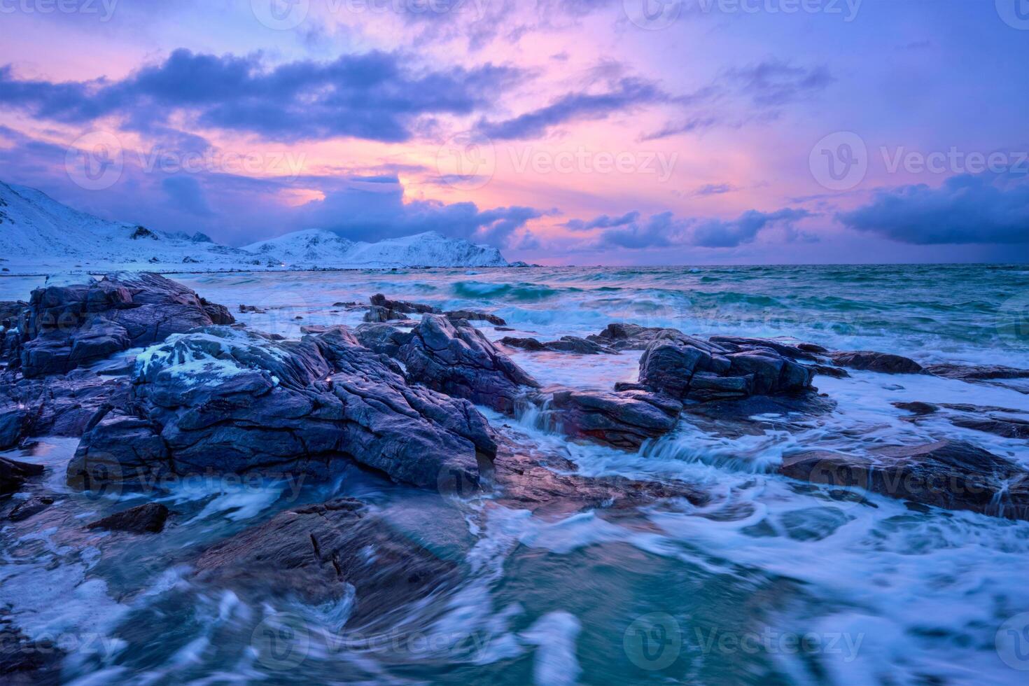 Norwegian Sea waves on rocky coast of Lofoten islands, Norway photo