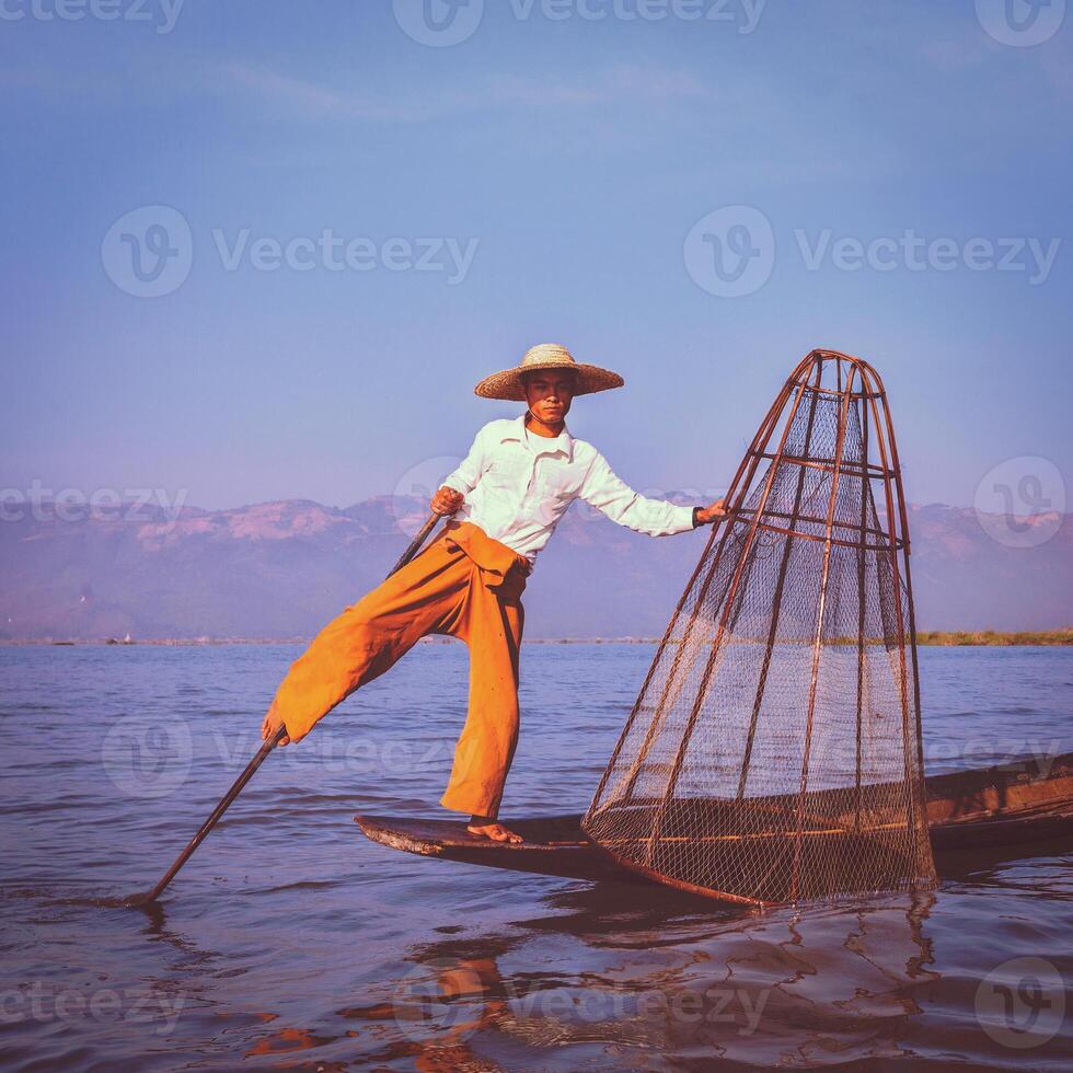 Traditional Burmese fisherman at Inle lake Myanmar photo