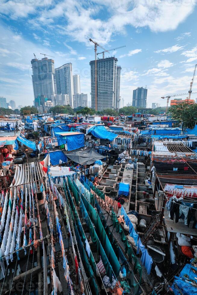 Dhobi Ghat Mahalaxmi Dhobi Ghat is an open air laundromat lavoir in Mumbai, India with laundry drying on ropes photo