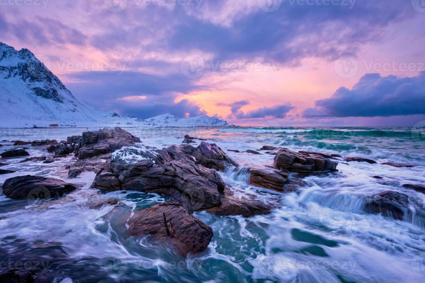 Norwegian Sea waves on rocky coast of Lofoten islands, Norway photo