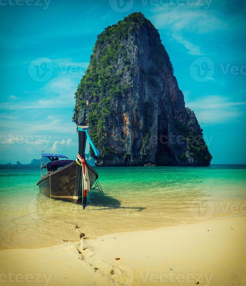 Long tail boat on beach, Thailand photo