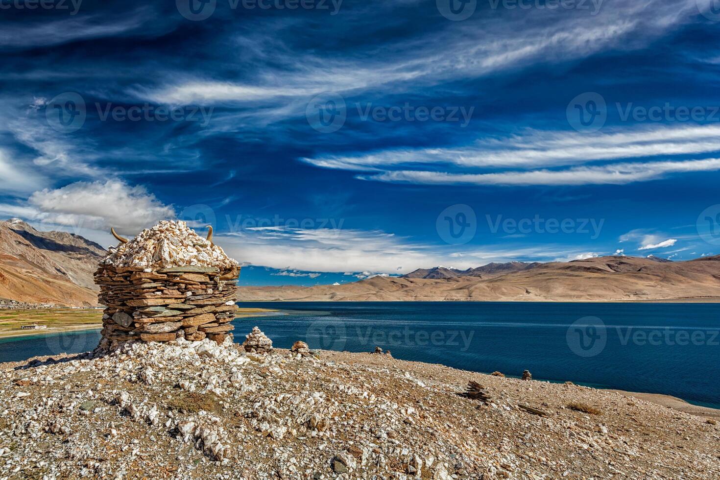 Stone cairn at Himalayan lake Tso Moriri, photo