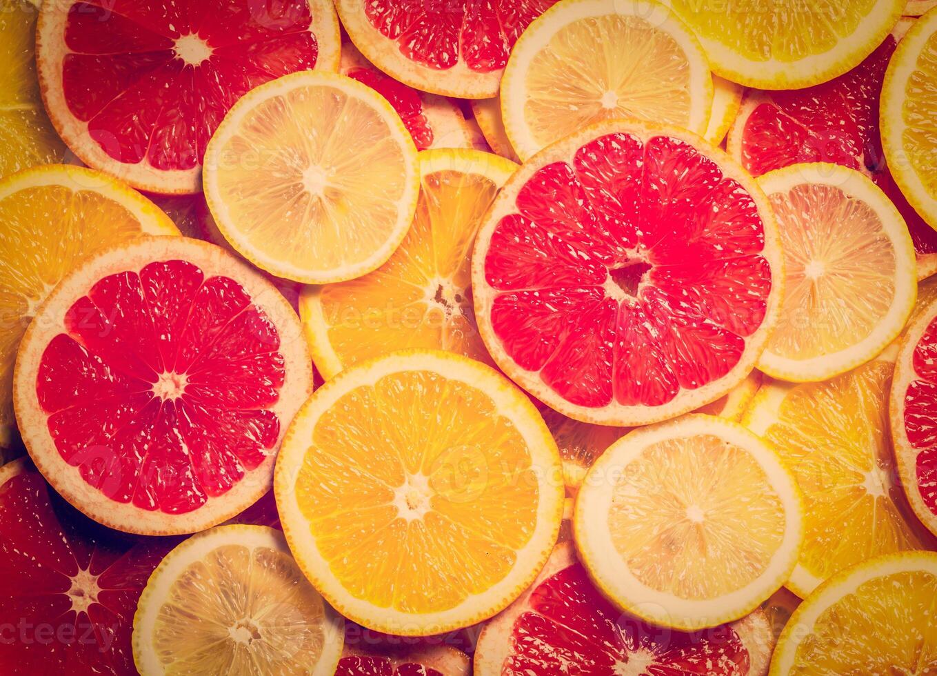 Colorful citrus fruit slices photo