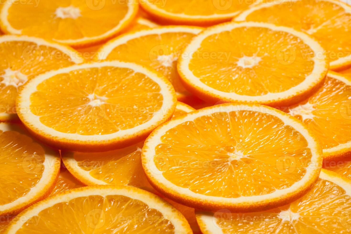 Colorful orange fruit slices photo