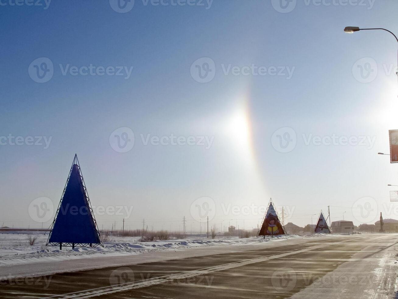 halo in sky over Salekhard. Pargelius phenomenon. photo