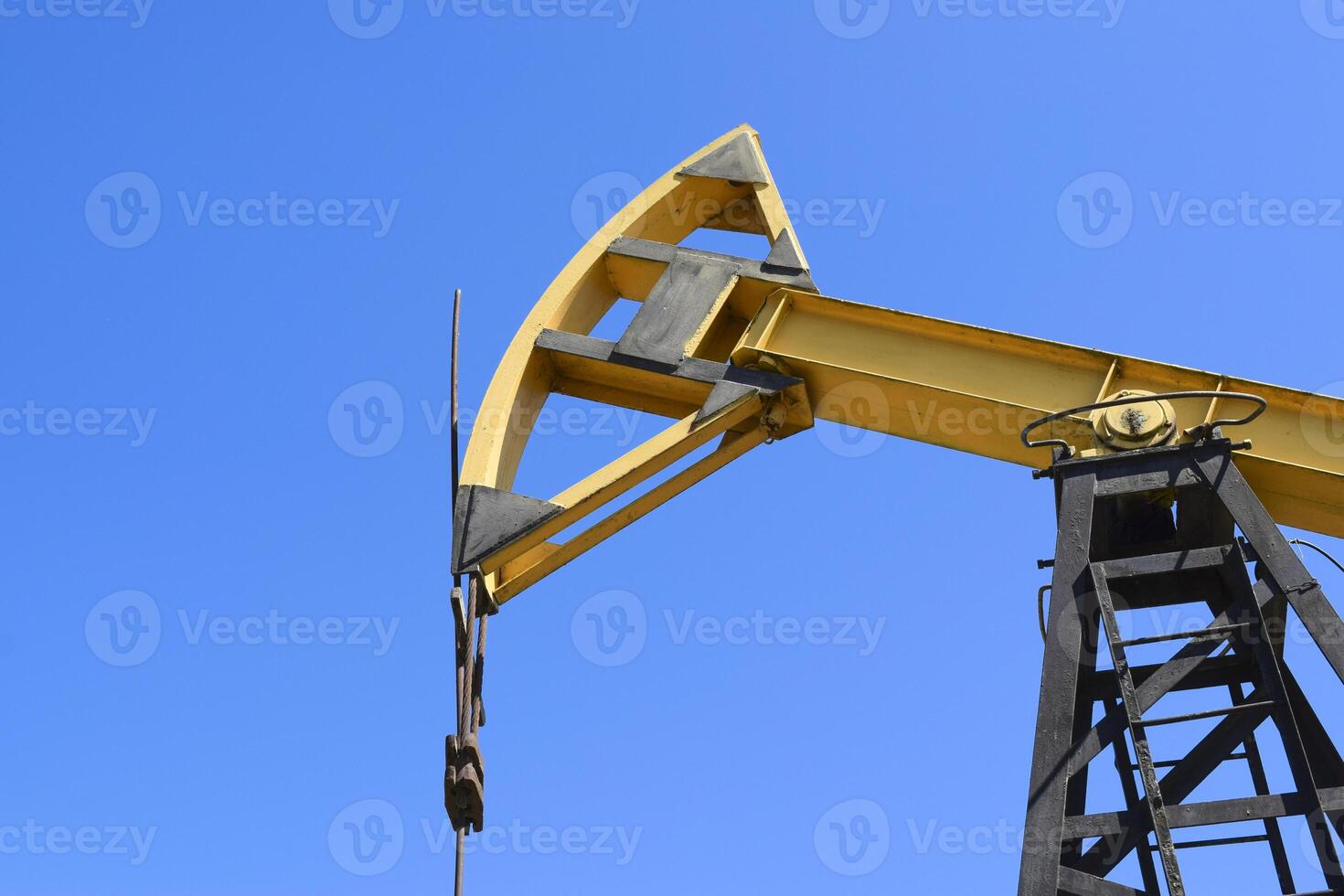 Pumping unit as the oil pump installed on a well photo