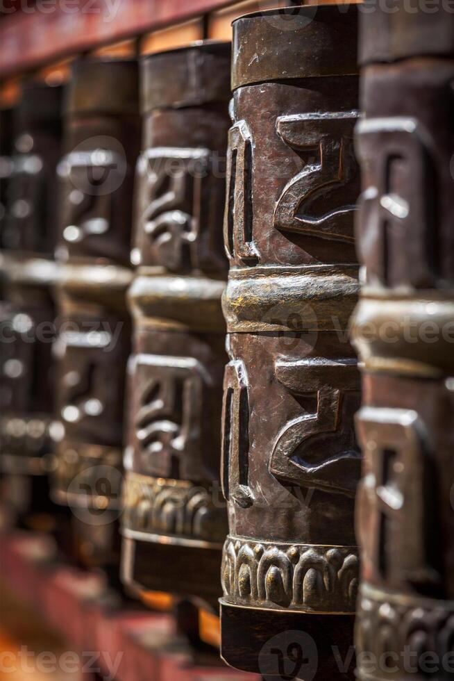 Buddhist prayer wheels photo