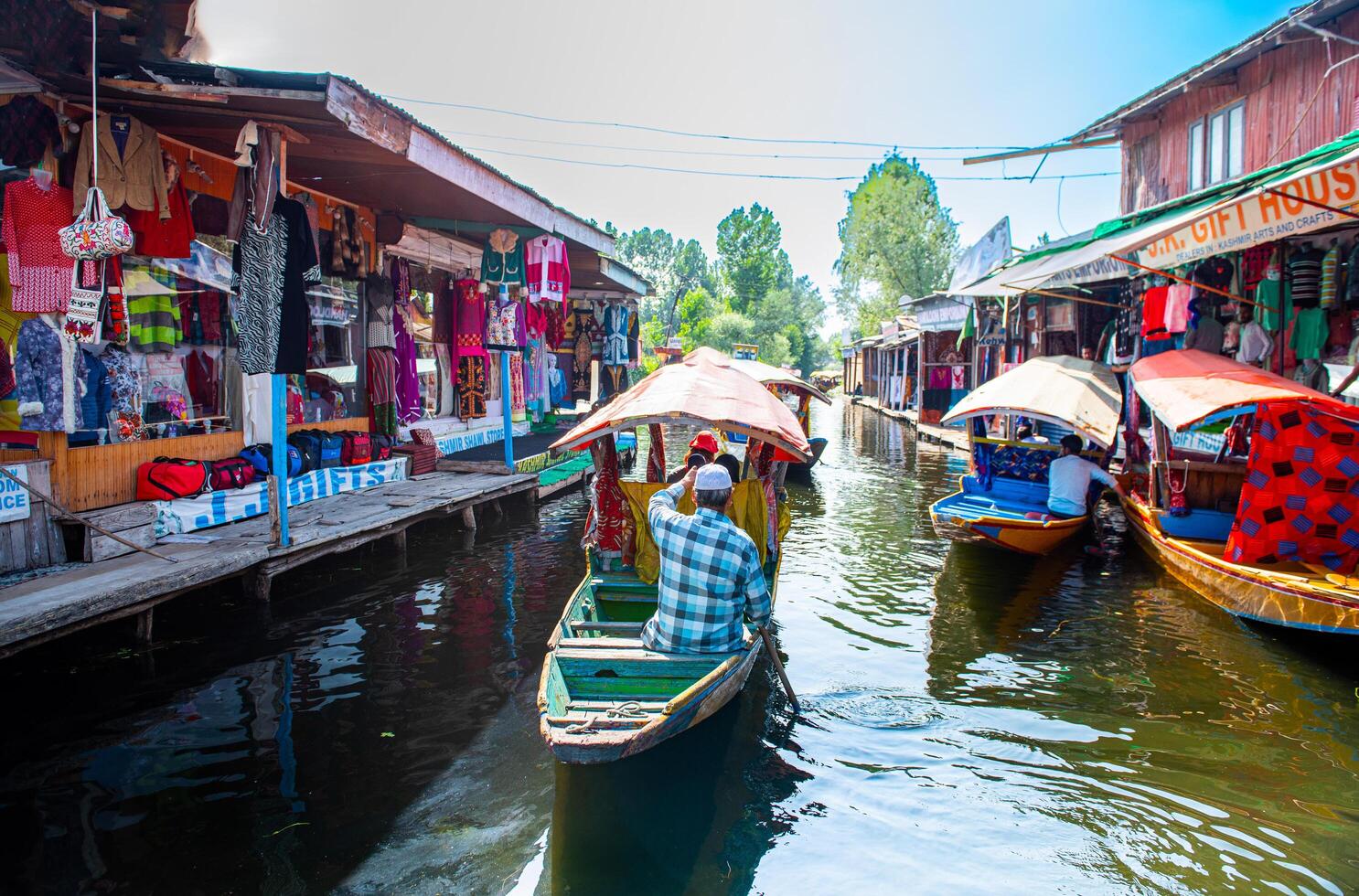 Dal Lake and the beautiful mountain range in the background, in the summer Boat Trip, of city Srinagar Kashmir India. photo