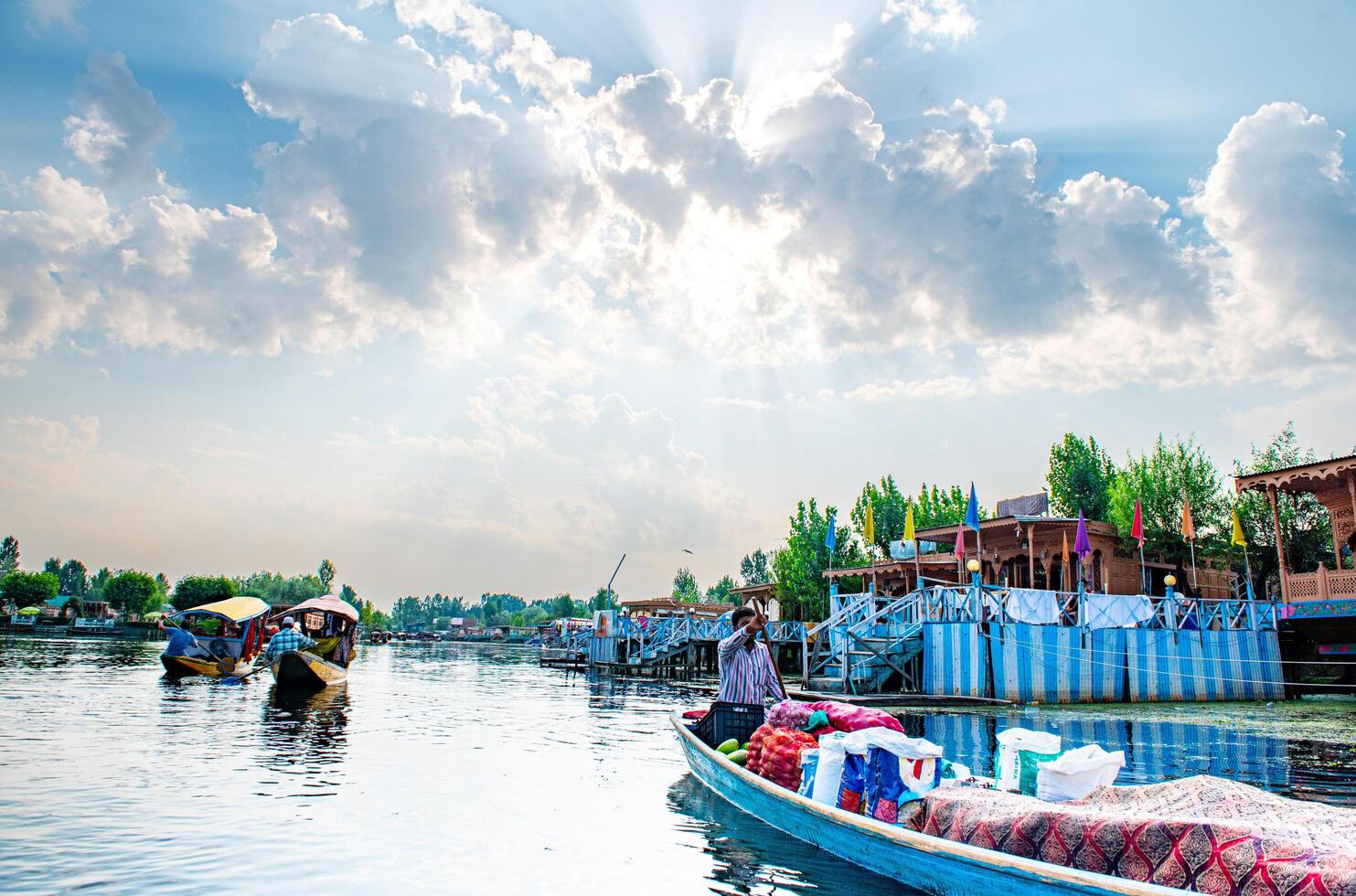 Dal Lake and the beautiful mountain range in the background, in the summer Boat Trip, of city Srinagar Kashmir India. photo