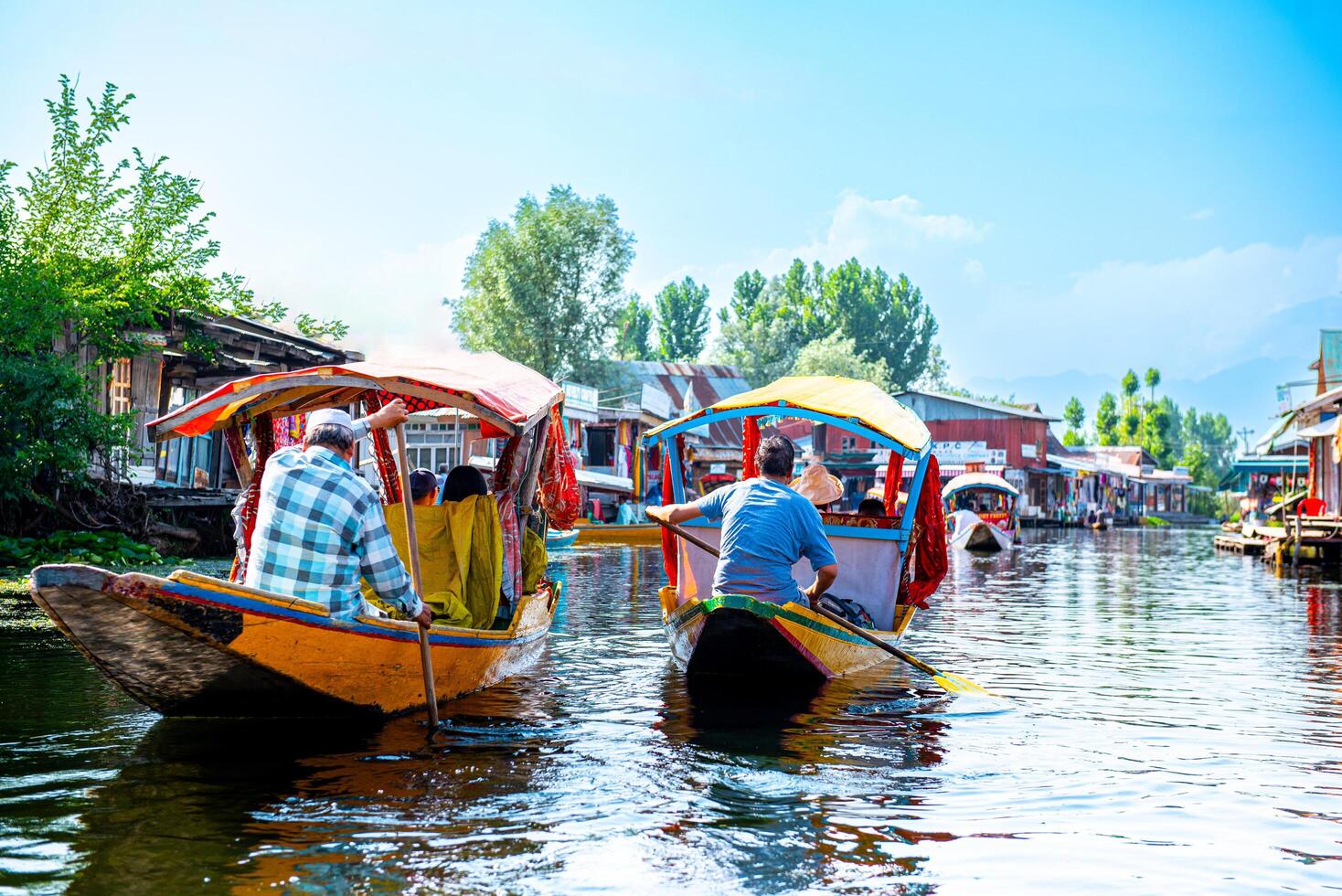 Dal Lake and the beautiful mountain range in the background, in the summer Boat Trip, of city Srinagar Kashmir India. photo