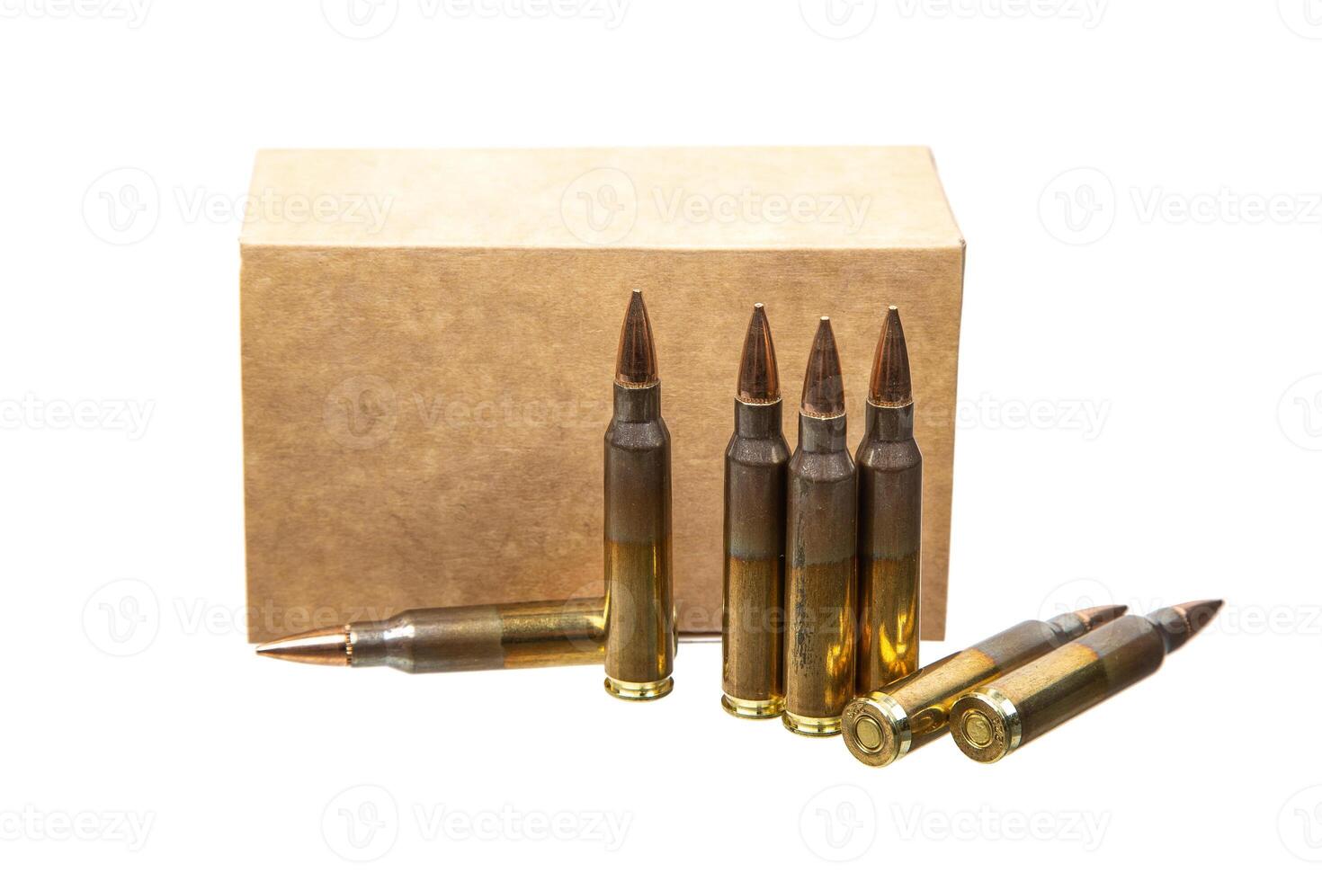 Carbine and rifle cartridges. Ammunition for weapons. Box of cartridges on a white back photo