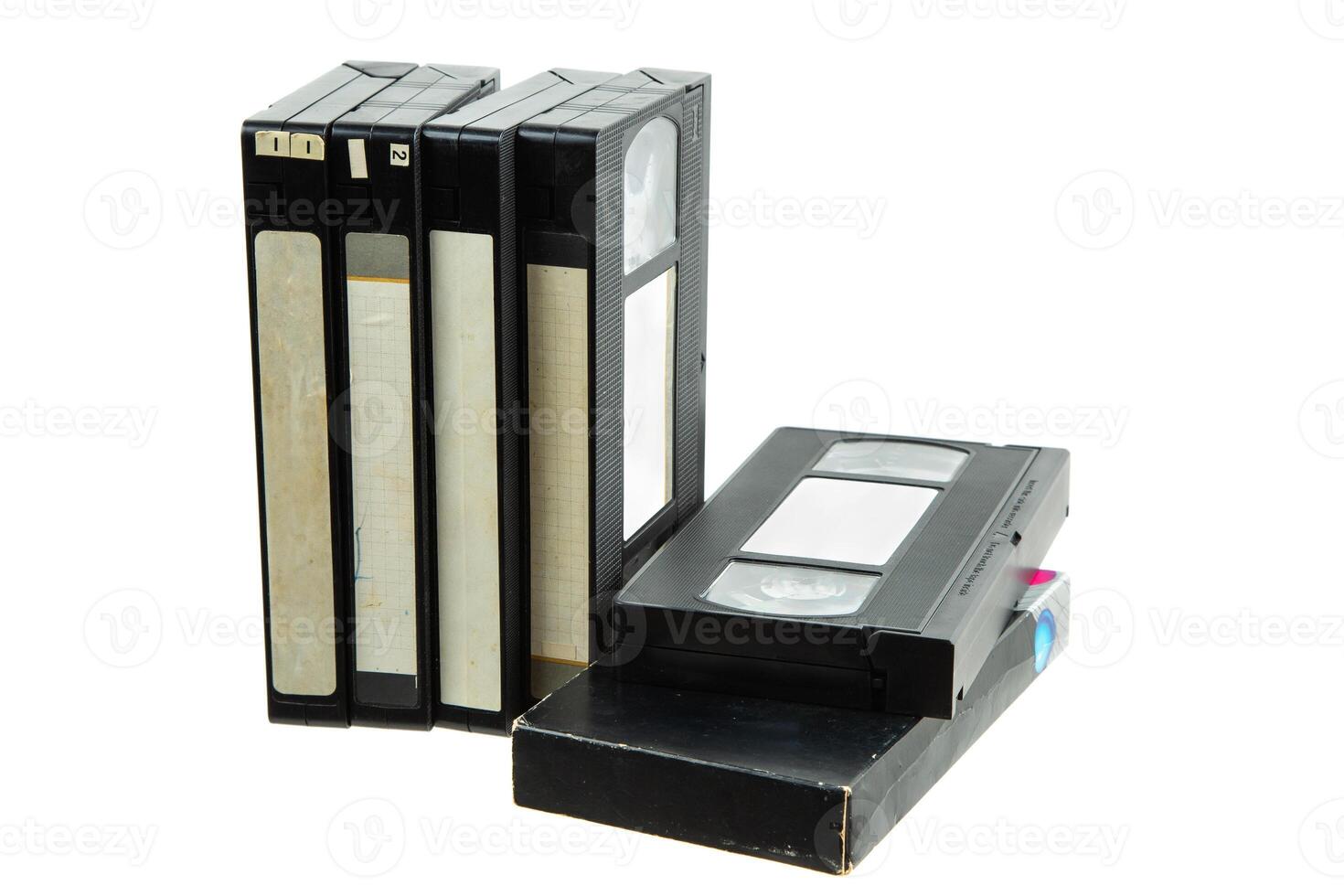 Pile of VHS video cassettes. Vintage media. Isolate on a white back. photo