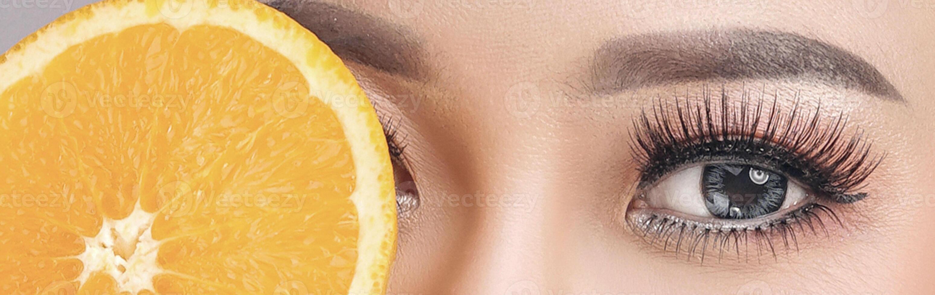 Close up image of healthy human woman eye with women eyelashes photo