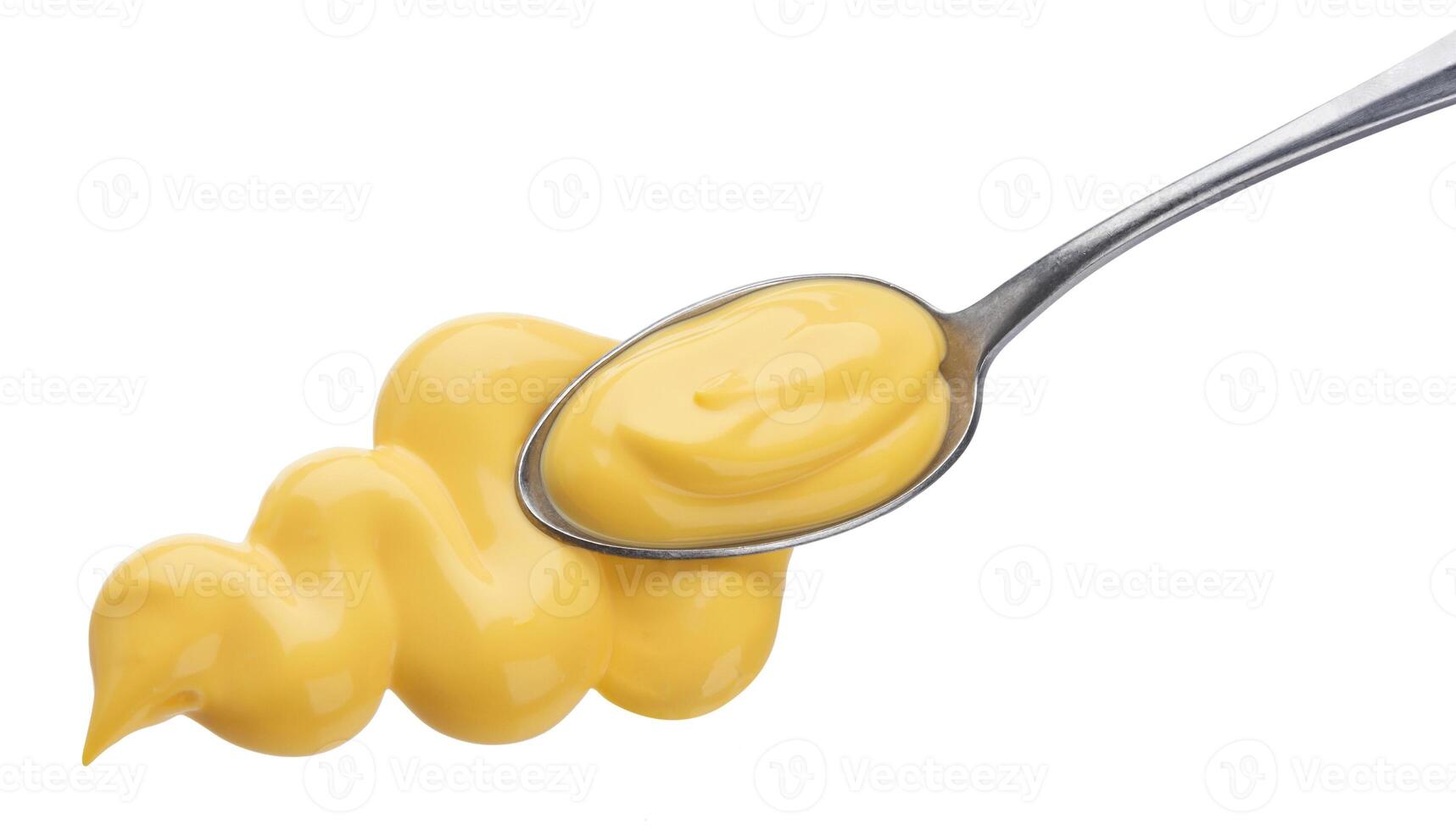 Cheese sauce with spoon isolated on white background. Top view photo