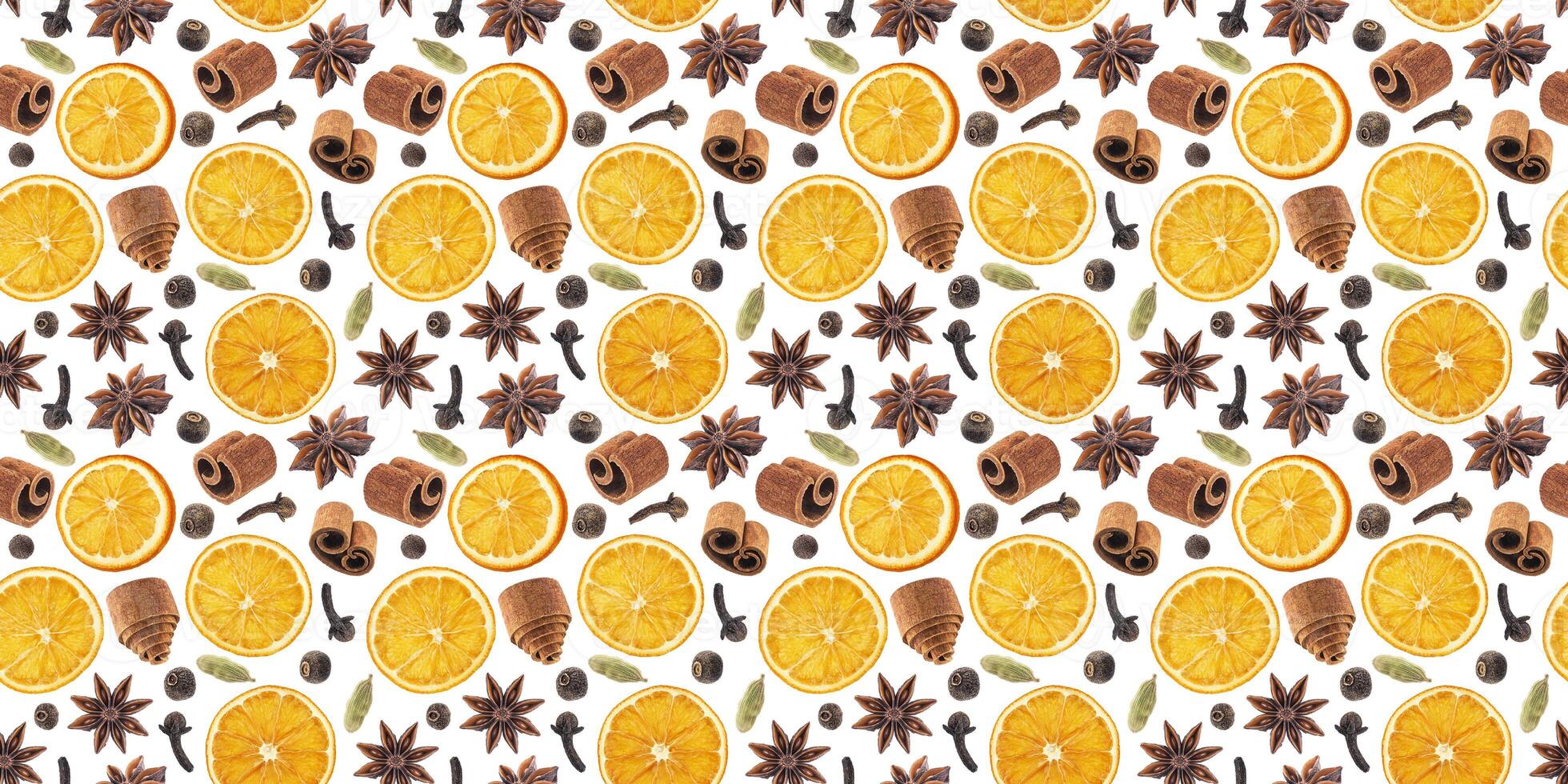 Seamless pattern of christmas spices for decoration. Ingredients for mulled wine isolated on white background. Cinnamon sticks, dried oranges, allspice, star anise. photo