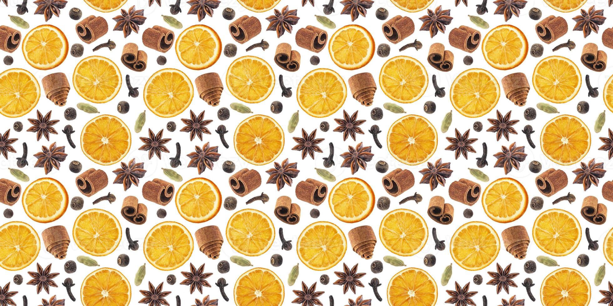 Seamless pattern of christmas spices for decoration. Ingredients for mulled wine isolated on white background. Cinnamon sticks, dried oranges, allspice, star anise. photo