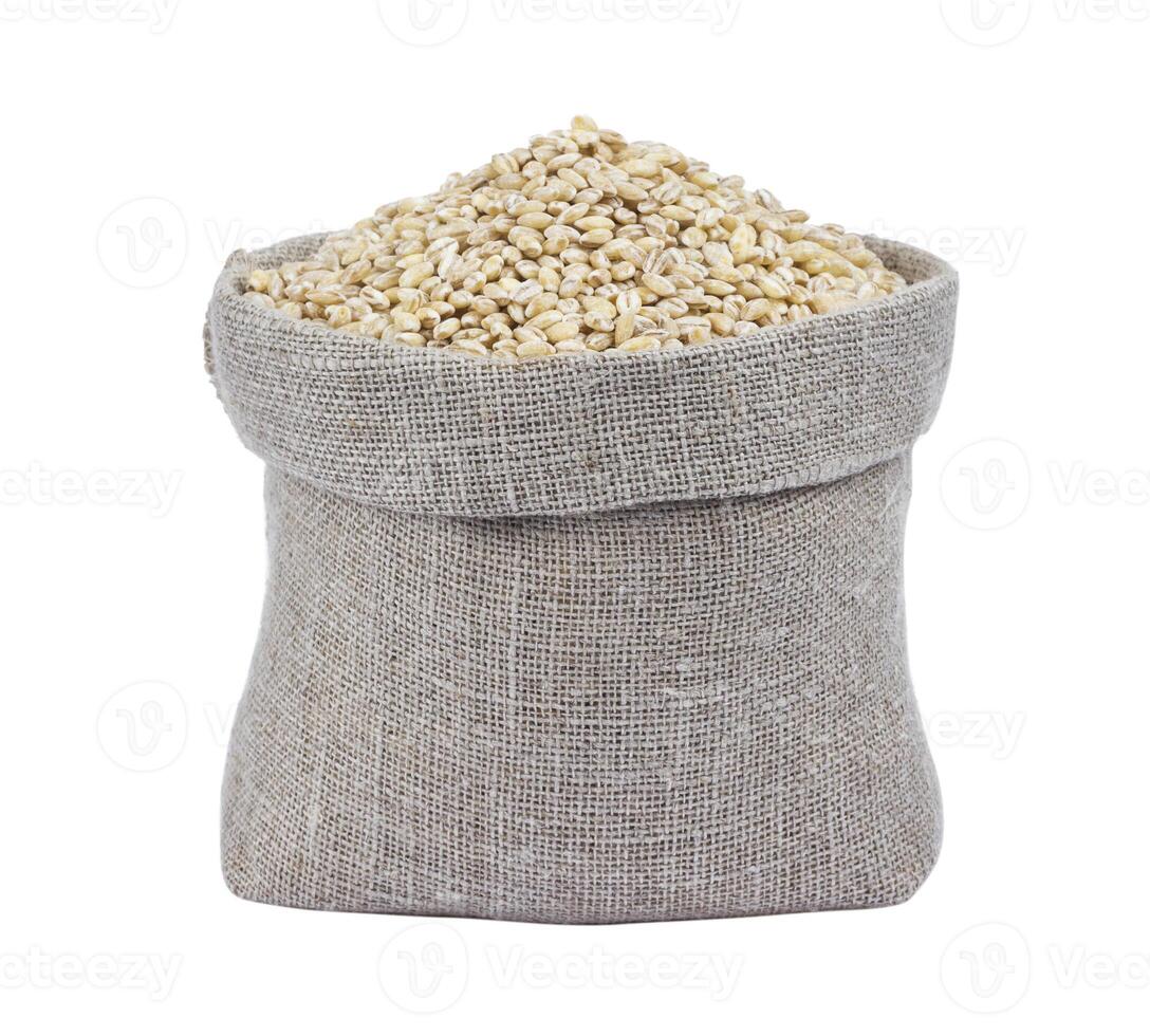 Pearl barley in bag isolated on white background photo