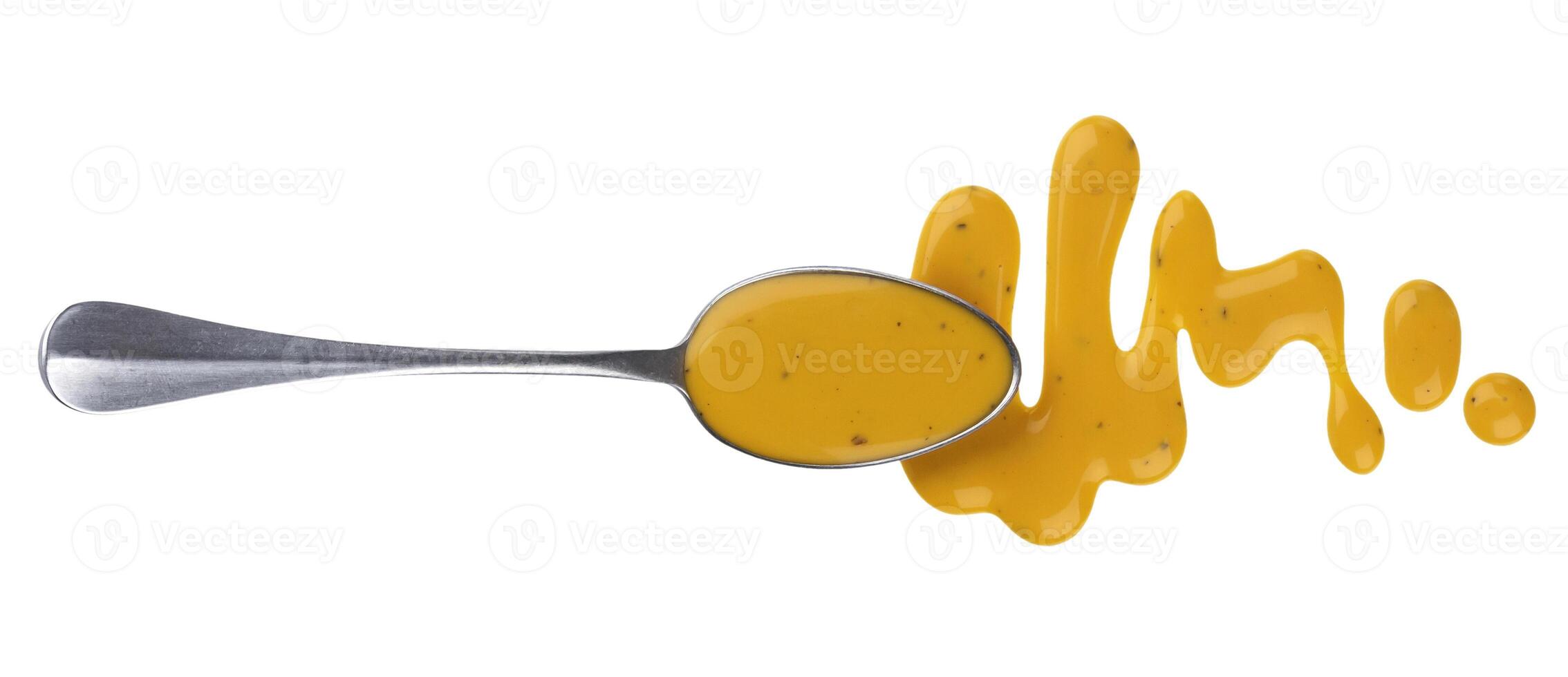 Honey mustard sauce with spoon isolated on white background. Top view photo