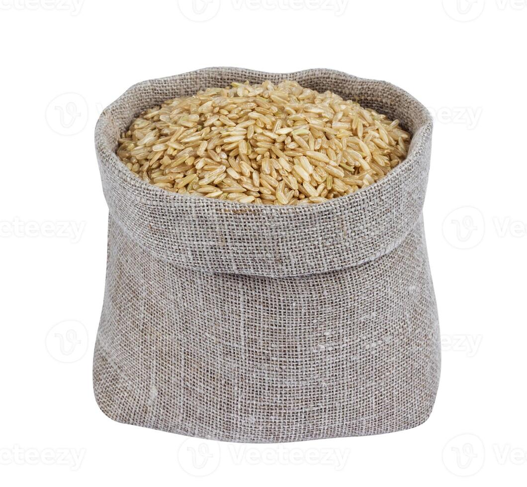 Brown rice in bag isolated on white background photo
