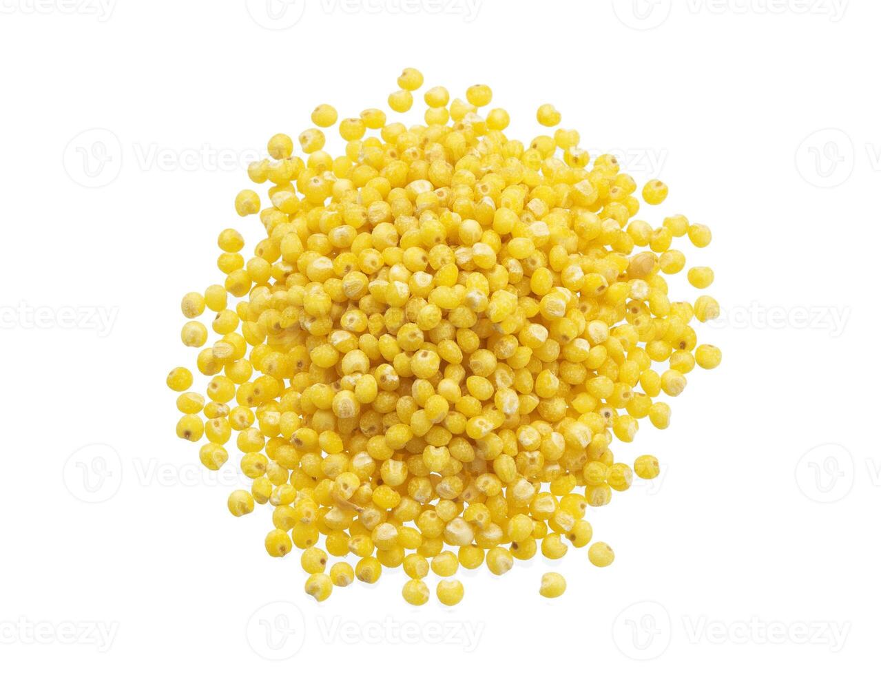 Heap of millet isolated on white background. Top view photo