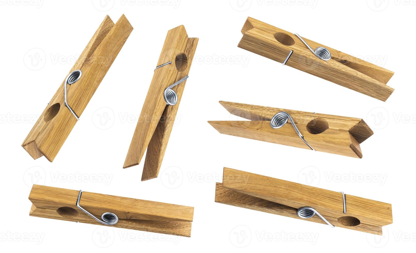 Wooden clothespins isolated on white background. photo