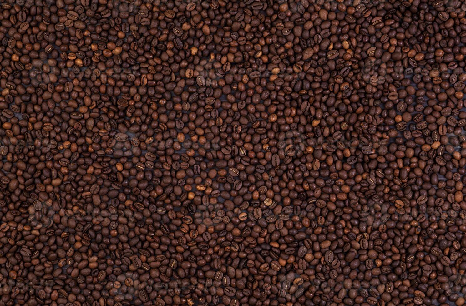 Coffee beans background, coffee texture, top view photo