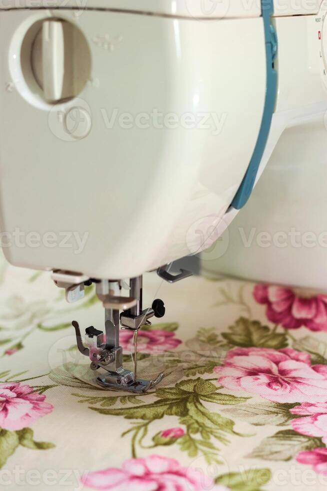 Modern sewing machine and item of clothing photo