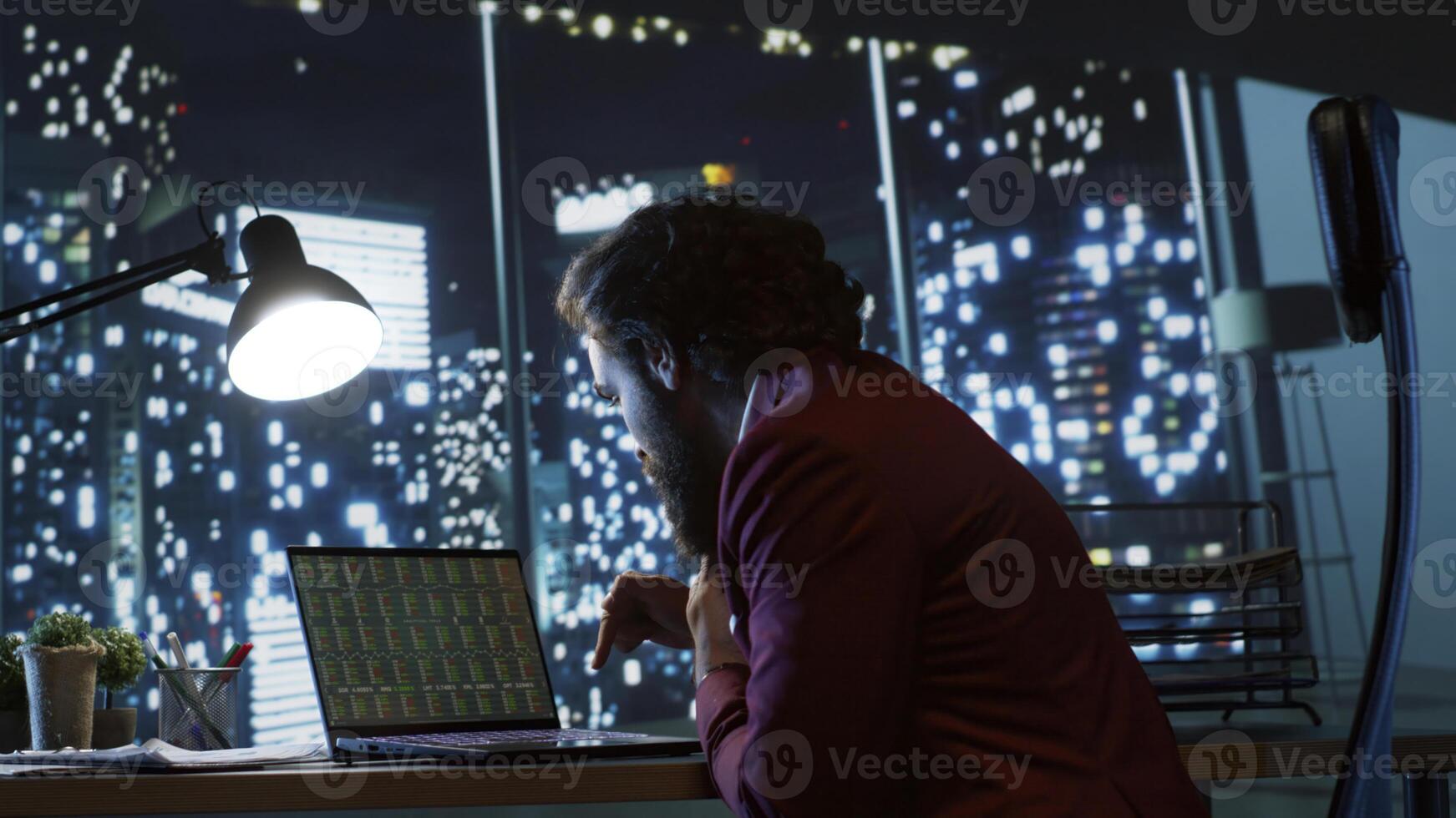 After wasting stock market trading profits, enraged shareholder phones his financial expert, shouting at him for damaging his global company. On landline phone call, powerful angry capitalist yells. photo