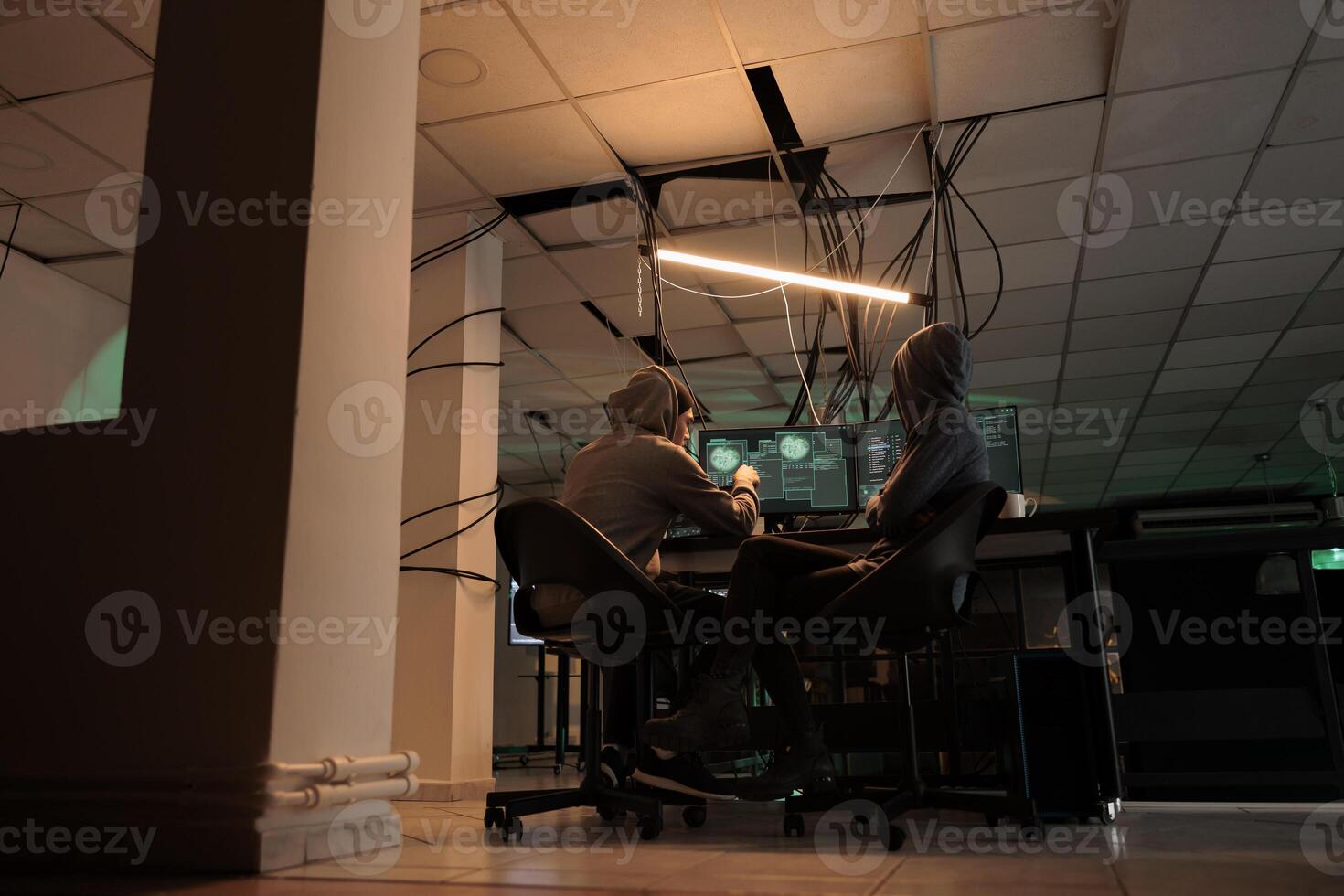 Cybercrime, hackers team coding internet virus program, hacking computer system, developers programming firewall. Criminals cracking password, developing malicious software photo