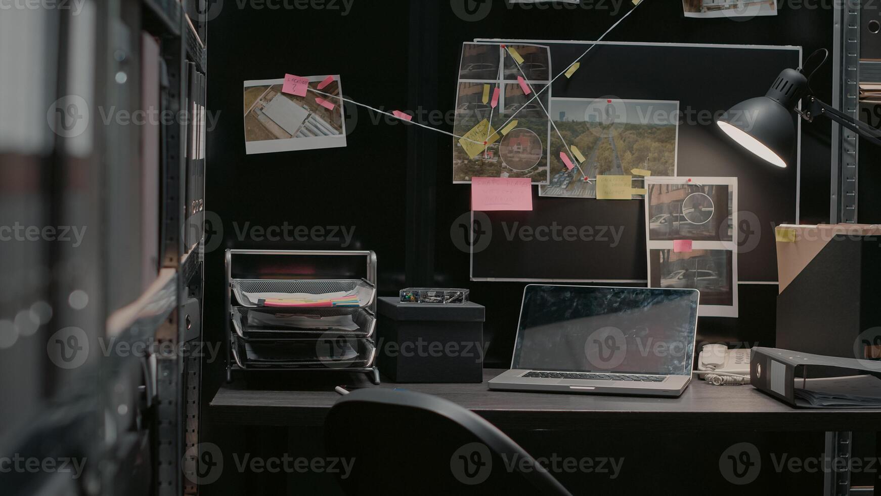 Empty incident room with criminal case investigation, board with clues and evidence. Suspicious research photos and file folders on racks, federal confidential documents in agency office.