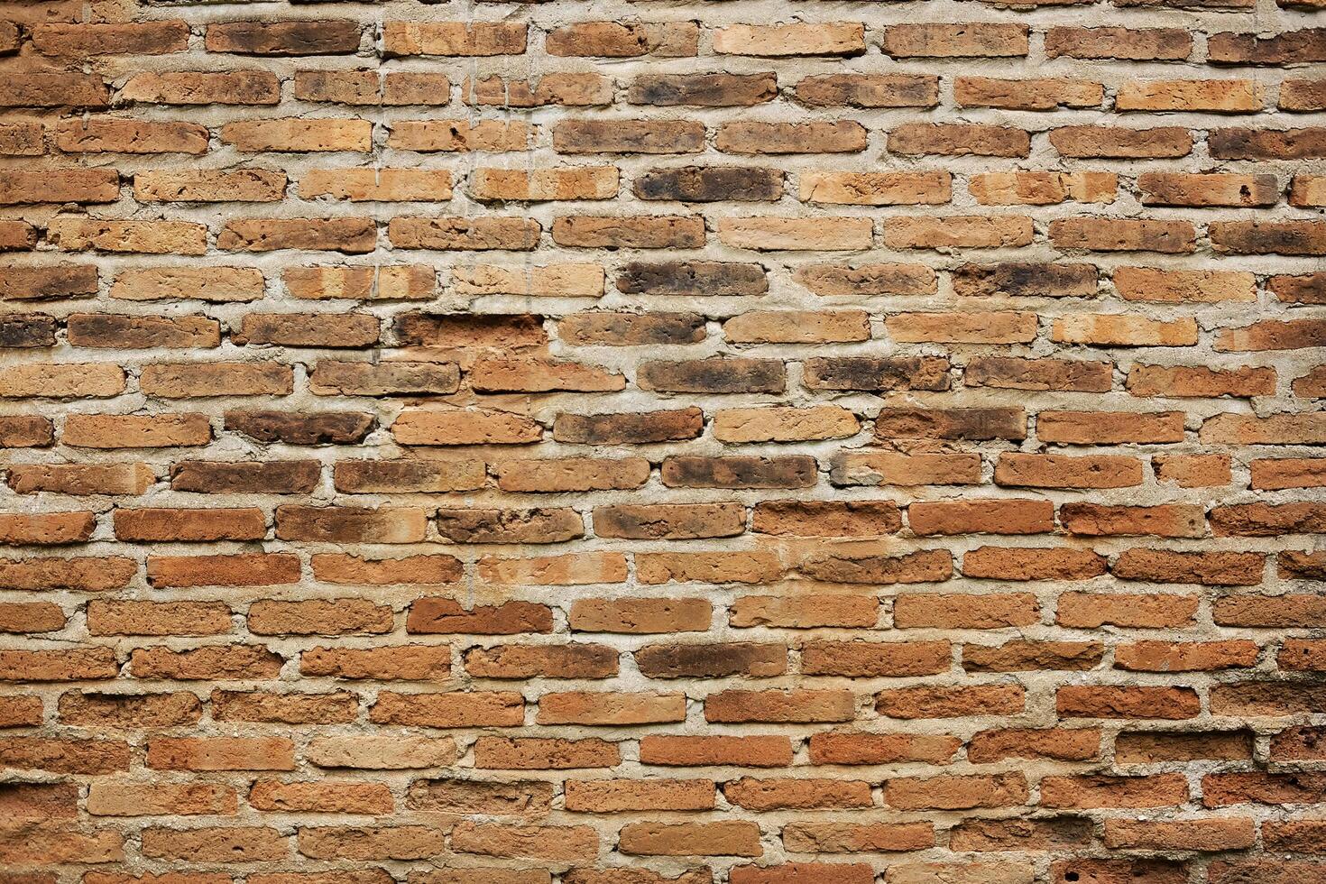 Orange brick wall pattern texture background photo