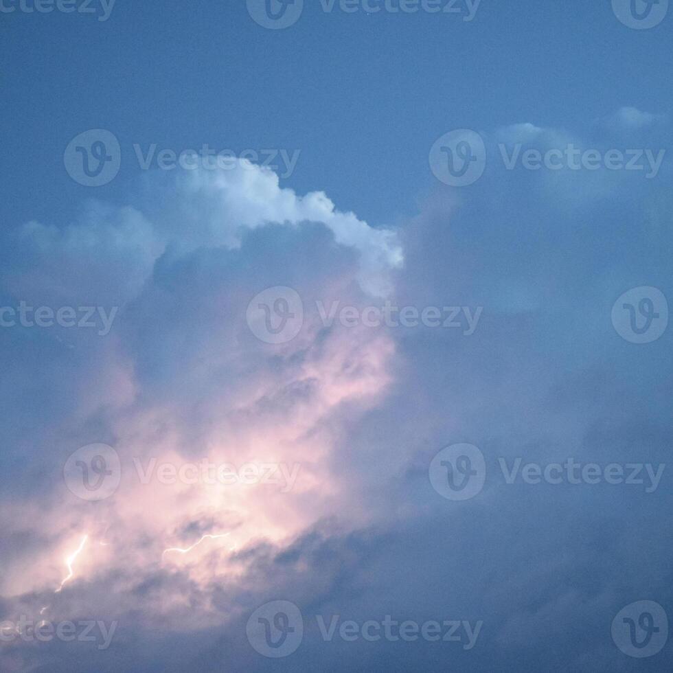 Lightnings in storm clouds photo