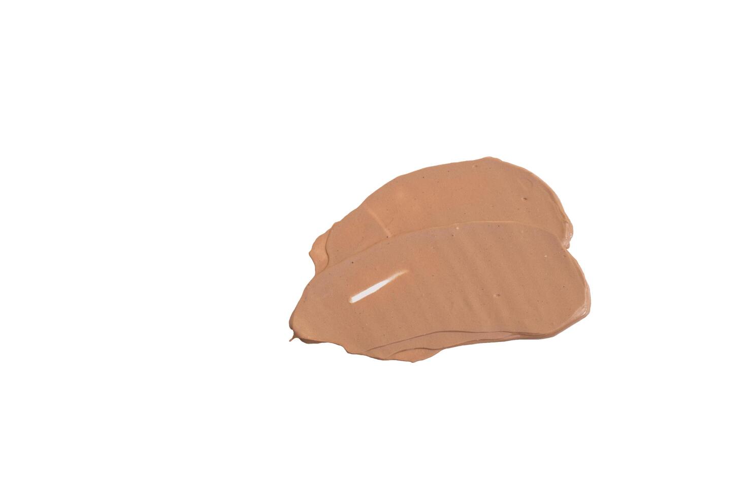 close-up smear of foundation, red clay masks on a white background photo