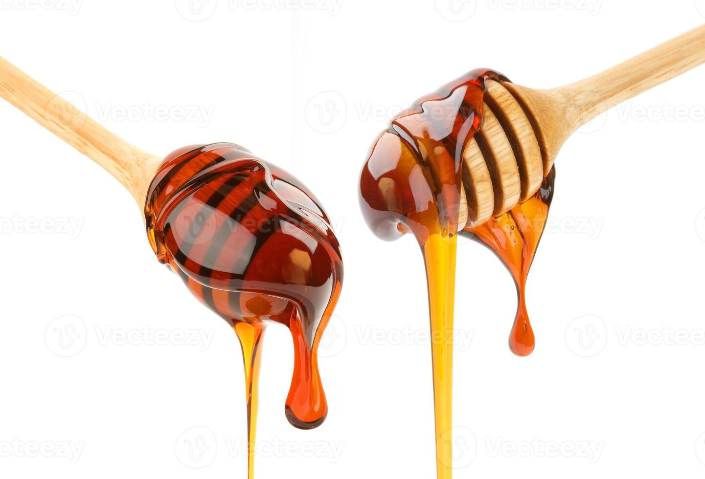 Honey stick isolated on white photo